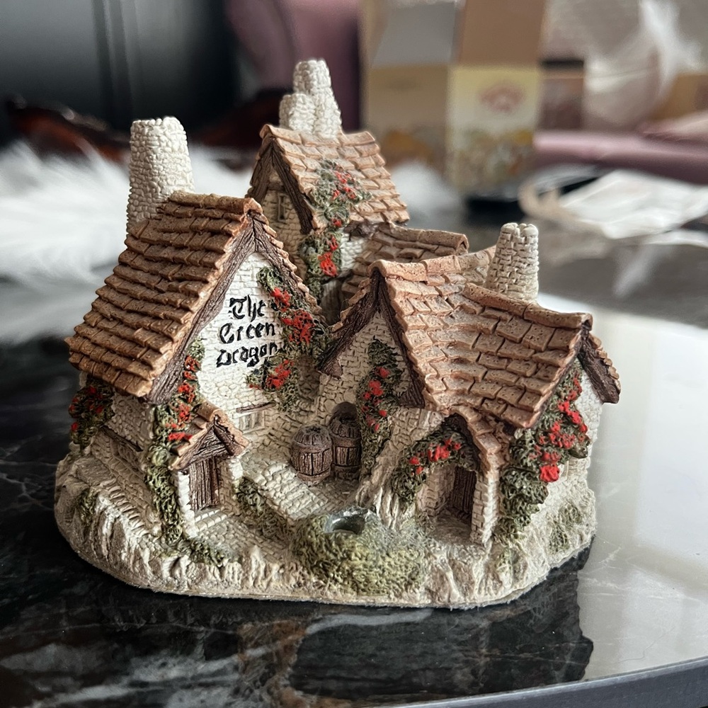 Charming Cottage - note damage in front (missing tree?)